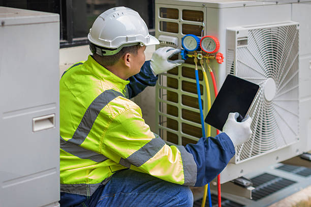 Professional Emergency Hvac Repair technician working in O Fallon, IL